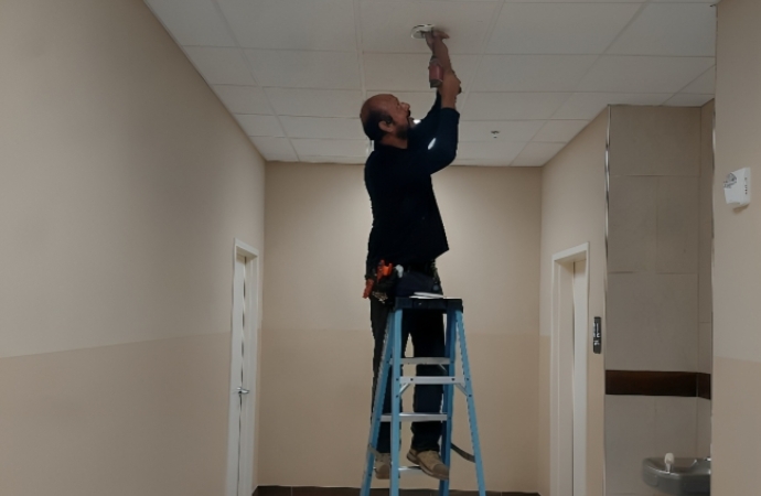 Low Voltage Houston's a Certified Technician Working